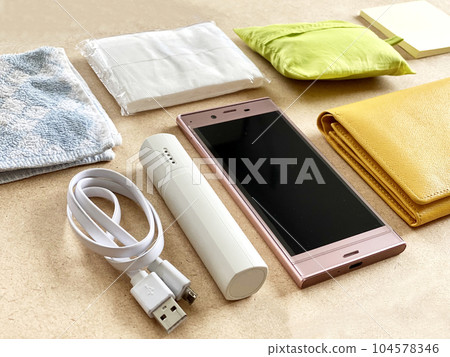 Personal belongings such as smartphones, wallets, and mobile bags Personal belongings such as smartphones, wallets, and mobile bags 104578346