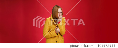 Girl getting cold, coughing and buttoning yelling light coat as freezing on chilly, windy weather looking displeased and ill at camera, feeling unwell catching flu over red background Girl getting cold, coughing and buttoning yelling light coat as freezing on chilly, windy weather looking displeased and ill at camera, feeling unwell catching flu over red background 104578511