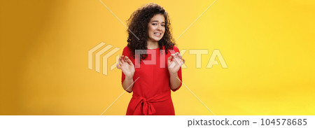 Girl hates washing dished grimacing from dislike and disgust wanting puke from aversion raising palms and stepping back frowning refusing displeasing offer over yellow background Girl hates washing dished grimacing from dislike and disgust wanting puke from aversion raising palms and stepping back frowning refusing displeasing offer over yellow background 104578685