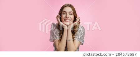Attractive lovely tender feminine cute woman leaning palms looking joyfully camera smiling touched fluffy puppy adorable scene grinning happiness being moved expressing sympathy joy, pink background Attractive lovely tender feminine cute woman leaning palms looking joyfully camera smiling touched fluffy puppy adorable scene grinning happiness being moved expressing sympathy joy, pink background 104578687