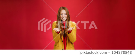 Girl with tender and caring expression smiling extanding hands forward as giving thanks or pointing at someone special feeling admiration thanking partner for support, confessing in love and sympathy Girl with tender and caring expression smiling extanding hands forward as giving thanks or pointing at someone special feeling admiration thanking partner for support, confessing in love and sympathy 104578848