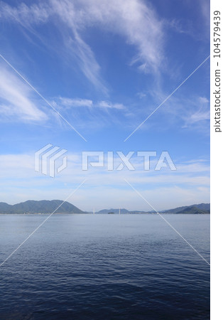 View of Tatara Bridge on the Setouchi Shimanami Kaido from Saiwaizaki, Mihara City (left of the bridge is Ikuchijima, right is Omishima, back is Hakatajima) 104579439