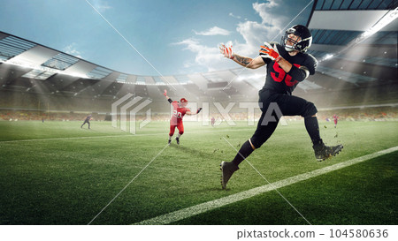 Dynamic image of professional sportsmen, american football player in motions during game running at 3D stadium with flashlights Dynamic image of professional sportsmen, american football player in motions during game running at 3D stadium with flashlights 104580636