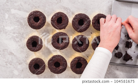 Flat lay. Step by step. Filling in chocolate cupcakes with chocolate ganache. 104581675