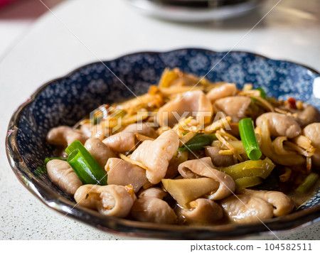 Fried pork intestine with shredded ginger Fried pork intestine with shredded ginger 104582511