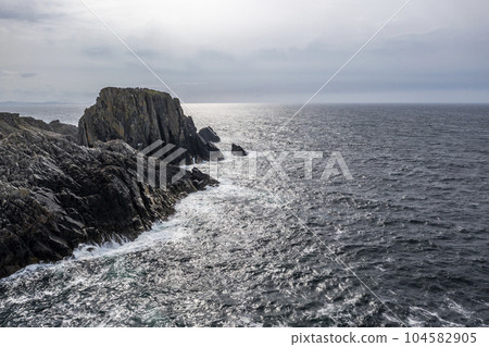 Aerial view of the coastline at Malin Head in Ireland. Aerial view of the coastline at Malin Head in Ireland. 104582905