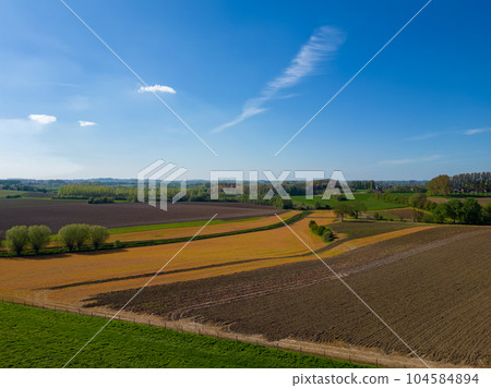 Patchwork of Beauty: Aerial View of Farm Fields in Belgian Pajottenland Patchwork of Beauty: Aerial View of Farm Fields in Belgian Pajottenland 104584894