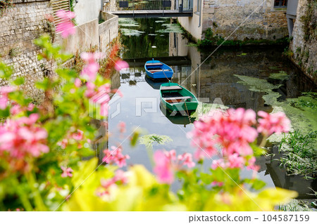 The water mill on the River Aure in the medieval town of Bayeux on the Normandy Coast of France. 104587159