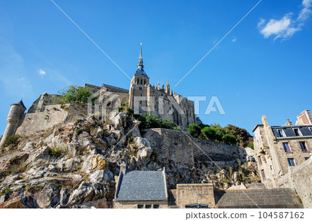 Panorama of Mont Saint Michele abbey in a beautiful summer day, France Panorama of Mont Saint Michele abbey in a beautiful summer day, France 104587162