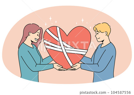 Happy man and woman hold in hands fixed broken heart 104587556