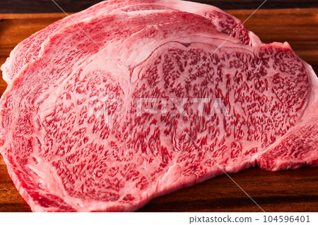Japanese brand beef (Wagyu), Saga beef served on a black plate 104596401