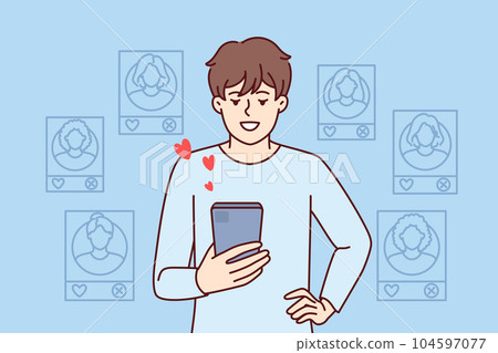 Man uses dating applications on mobile phone and looks through profiles of women likes 104597077