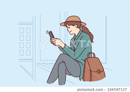 Woman is sitting at bus stop using phone to track public transport via GPS navigation Woman is sitting at bus stop using phone to track public transport via GPS navigation 104597137