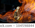 Grill steak tomahawk. Angus beef tbone on fire flame 104598844