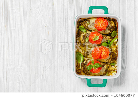 chicken breasts with pesto sauce, cheese, tomato 104600077