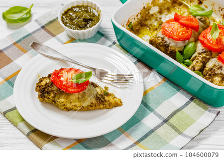 chicken breasts with pesto sauce, cheese, tomato chicken breasts with pesto sauce, cheese, tomato 104600079
