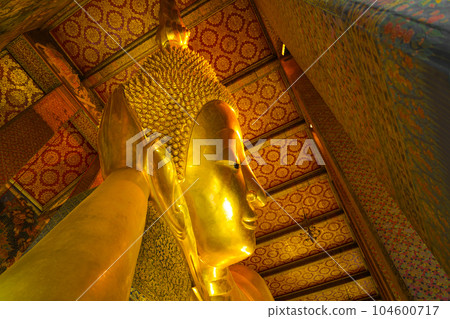Reclining Buddha at Wat Pho Chetuphon Temple (Bangkok, Thailand) Reclining Buddha at Wat Pho Chetuphon Temple (Bangkok, Thailand) 104600717