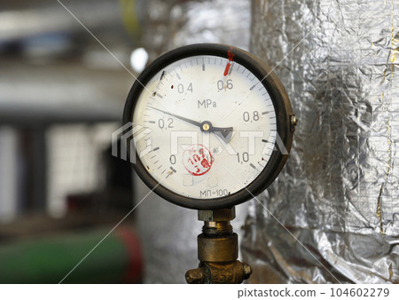 Manometer showing level of steam pressure inside of steam generation vessel Manometer showing level of steam pressure inside of steam generation vessel 104602279