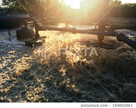 Machines are working hard to treat the wastewater from rubber scrap production to keep the environment clean 104602661