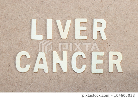 Wood alphabet letter in word liver cancer on wood background 104603038