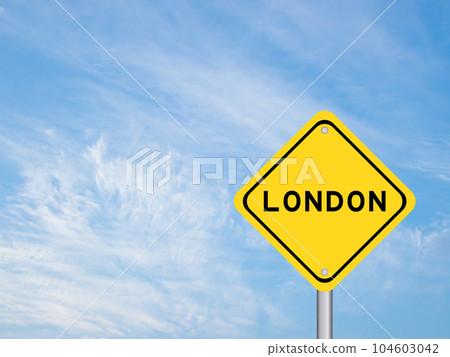 Yellow transportation sign with word london on blue color sky background Yellow transportation sign with word london on blue color sky background 104603042
