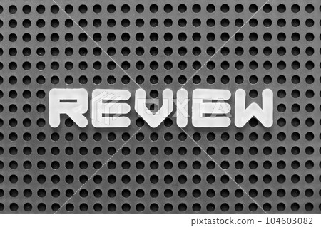 White alphabet letter in word review on black pegboard background White alphabet letter in word review on black pegboard background 104603082