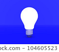 Light bulb against blue background 104605523