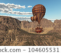 Fantasy hot air balloon over a mountain landscape 104605531