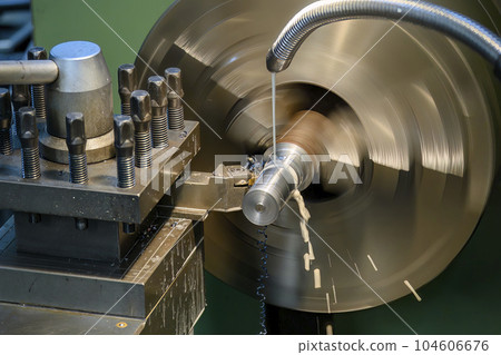 The lathe machine finish cut metal shaft parts with liquid coolant method. The lathe machine finish cut metal shaft parts with liquid coolant method. 104606676