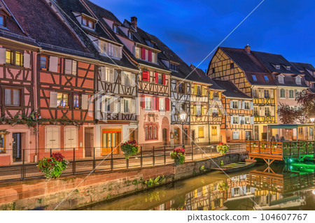 Colmar France, Colorful Half Timber House night city skyline 104607767