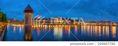 Lucerne (Luzern) Switzerland, night panorama city skyline at Chapel Bridge and Reuss River 104607780