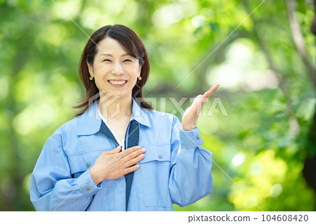 Woman in work clothes Fresh green Woman in work clothes Fresh green 104608420