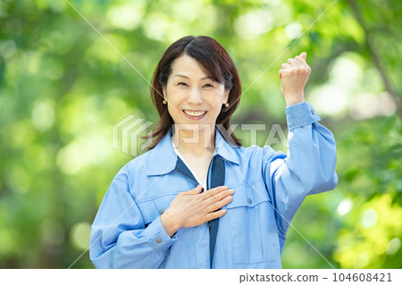 Woman in work clothes Fresh green 104608421