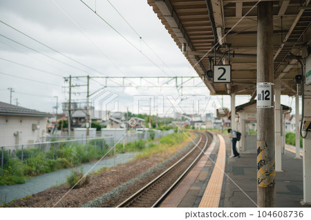 wait for the local train at the station wait for the local train at the station 104608736