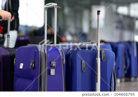 Suitcases in airport. Travel concept. 3d rendering. Suitcases in airport. Travel concept. 3d rendering. 104608795