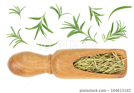 Dried rosemary or rosemarin leaves in wooden spoon isolated on white background top view Dried rosemary or rosemarin leaves in wooden spoon isolated on white background top view 104613185