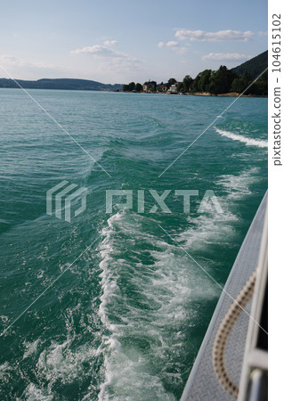View from the ship of waves in clear turquoise water 104615102