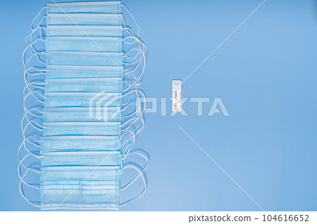 Test samples for coronavirus testing or analyzing, sterile medical mask on white background 104616652