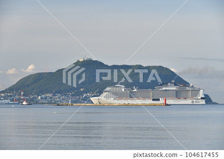 Photographing the scenery of the cruise ship MSC Bellissima calling at Hakodate Port, Hakodate City, Hokkaido in summer Photographing the scenery of the cruise ship MSC Bellissima calling at Hakodate Port, Hakodate City, Hokkaido in summer 104617455