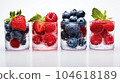 Frozen fruits in a transparent ice cube 104618189