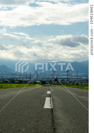 Straight road and Yamagata city 104619661