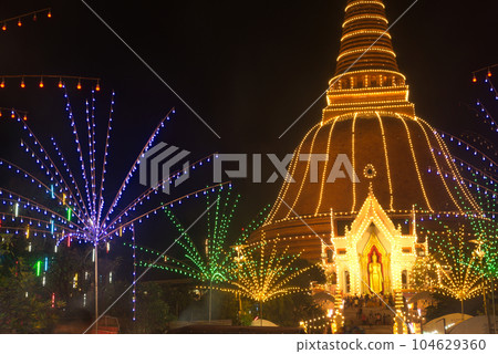 Colorful night lights at Wat Phra Pathom Chedi temple. The largest pagoda in the world on Loi Krathong Day. Which is an annual event held on a regular. Located at Nakhon Pathom Province in Thailand. Colorful night lights at Wat Phra Pathom Chedi temple. The largest pagoda in the world on Loi Krathong Day. Which is an annual event held on a regular. Located at Nakhon Pathom Province in Thailand. 104629360