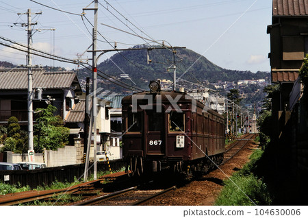 Nostalgic Hankyu Koyo Line train 810 series running with Mt. Nostalgic Hankyu Koyo Line train 810 series running with Mt. 104630006