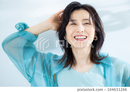 middle lady in aqua blue shirt middle lady in aqua blue shirt 104631266