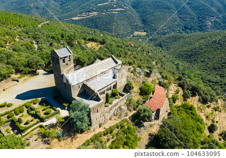 Aerial view of ancient Serrabone Priory in summer, France 104633095