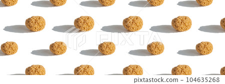 Natural sea sponge for the body on a beige background. Natural sea sponge for the body on a beige background. 104635268