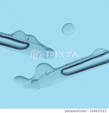 Pipette with cosmetic product in water with bubbles. 104635521