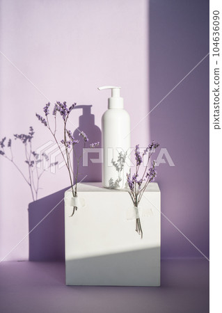 Jars of cosmetics on a purple background with lavender. 104636090