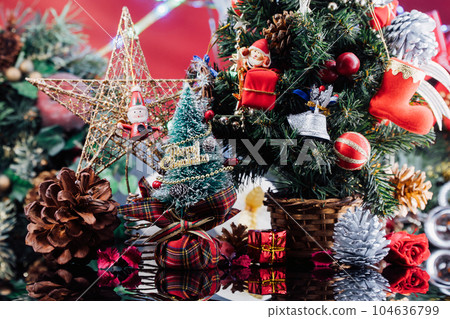 Christmas background with decorations and gift boxes on wooden 104636799
