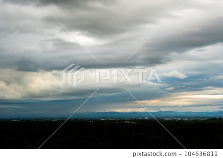 colorful dramatic sky with cloud at sunset. 104636811